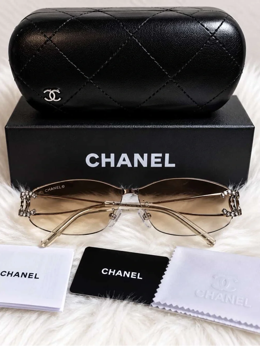 CHANEL Brown Gradient Rimless Women's Sunglasses with Gold Accents